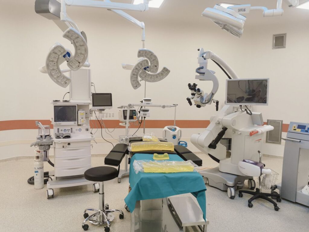 pexels photo 12104186 A state-of-the-art operating room fully equipped with advanced medical devices and surgical tools.