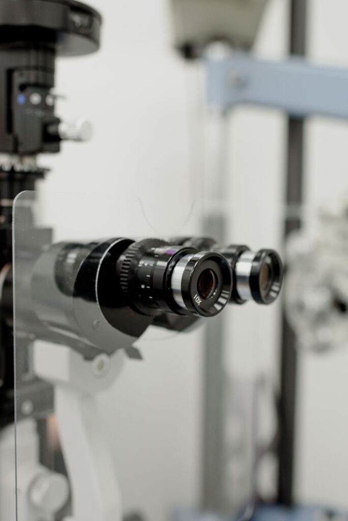pexels photo 5752262 Professional medical equipment for checking refractive power of eye with protective screen in modern clinic